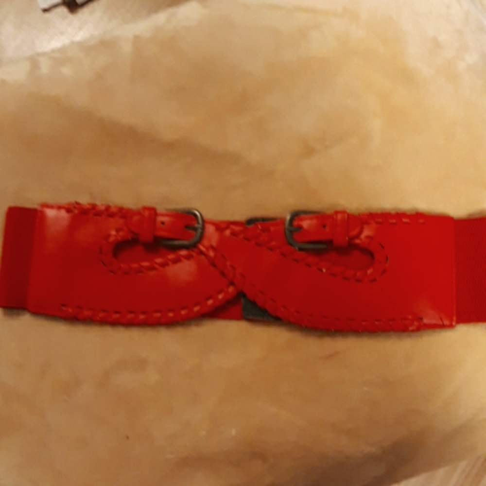 Wide red double buckle crossed leather belt